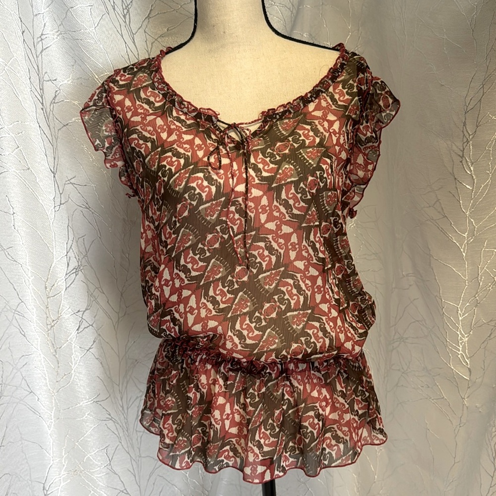 Sheer boho-style coral and brown peasant blouse